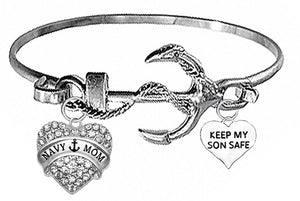Navy Mom, Keep My Son Safe On A Silvertone Anchor Cuff Bracelet. Genuine Austrian Cut Crystal Heart Charm. What A Wonderful Gift For Yourself, Or Someone Special. Gift Ready, Comes In A Black Velvet Bag.