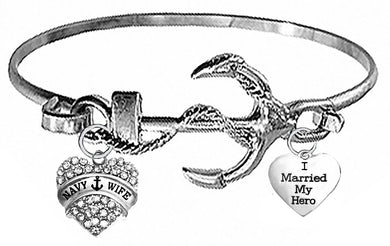 Navy Wife, I Married My Hero, On A Silvertone Anchor Cuff Bracelet. Genuine Austrian Cut Crystal Heart Charm. What A Wonderful Gift For Yourself, Or Someone Special. Gift Ready, Comes In A Black Velvet Bag.