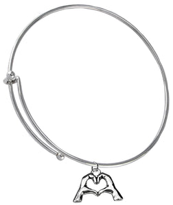 Everyone Is Doing It! Forming Their Fingers And Hands Into The Shape Of A Heart Saying, I Love You" On A Silvertone Adjustable Miracle Wire Bracelet. What A Great Gift For Yourself Or Someone Special. Gift Ready, Comes In A Small Black Velvet Bag.