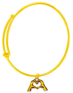 Everyone Is Doing It! Forming Their Fingers And Hands Into The Shape Of A Heart Saying &nbsp;"I Love You" On A 14 KT Goldtone Adjustable Miracle Wire Bracelet. What A Great Gift For Yourself Or Someone Special. Gift Ready Comes In A Small Black Velvet Bag