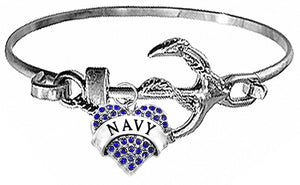 Navy On A Silvertone Anchor Cuff Bracelet. Genuine Azure Blue Austrian Cut Crystal Heart Charm. What A Wonderful Gift For Yourself, Or Someone Special. Gift Ready, Comes In A Black Velvet Bag.