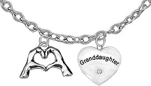 Granddaughter,This charming gift is the perfect way to express your love, Crafted with care, a design that captures the shape of your fingers and hands coming together to form a heart, symbolizing the deep connection