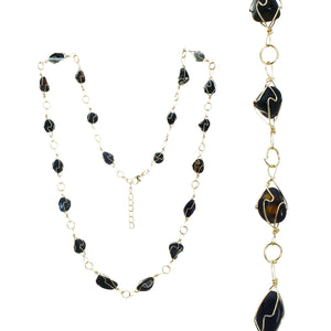 Adjustable Gold-tone Wire Necklace With Multiple Smooth Jet And Dark Topaz Toned Stones In Gold-tone Wire Settings