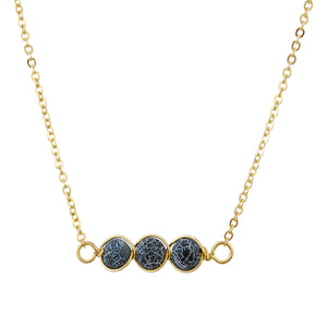 Gold Tone Chain Necklace With Three Round Black And White Marble Toned Stones In Wire Pendant